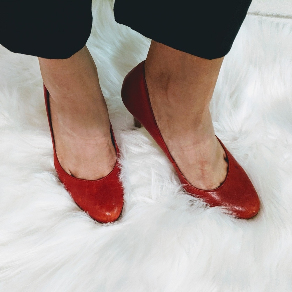 Red leather pumps